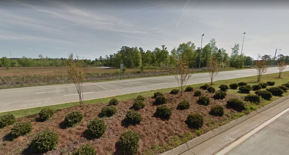 PRICE IMPROVEMENT West Point Land For Sale 3.98 AC: Kia Boulevard , West Point , GA 30240